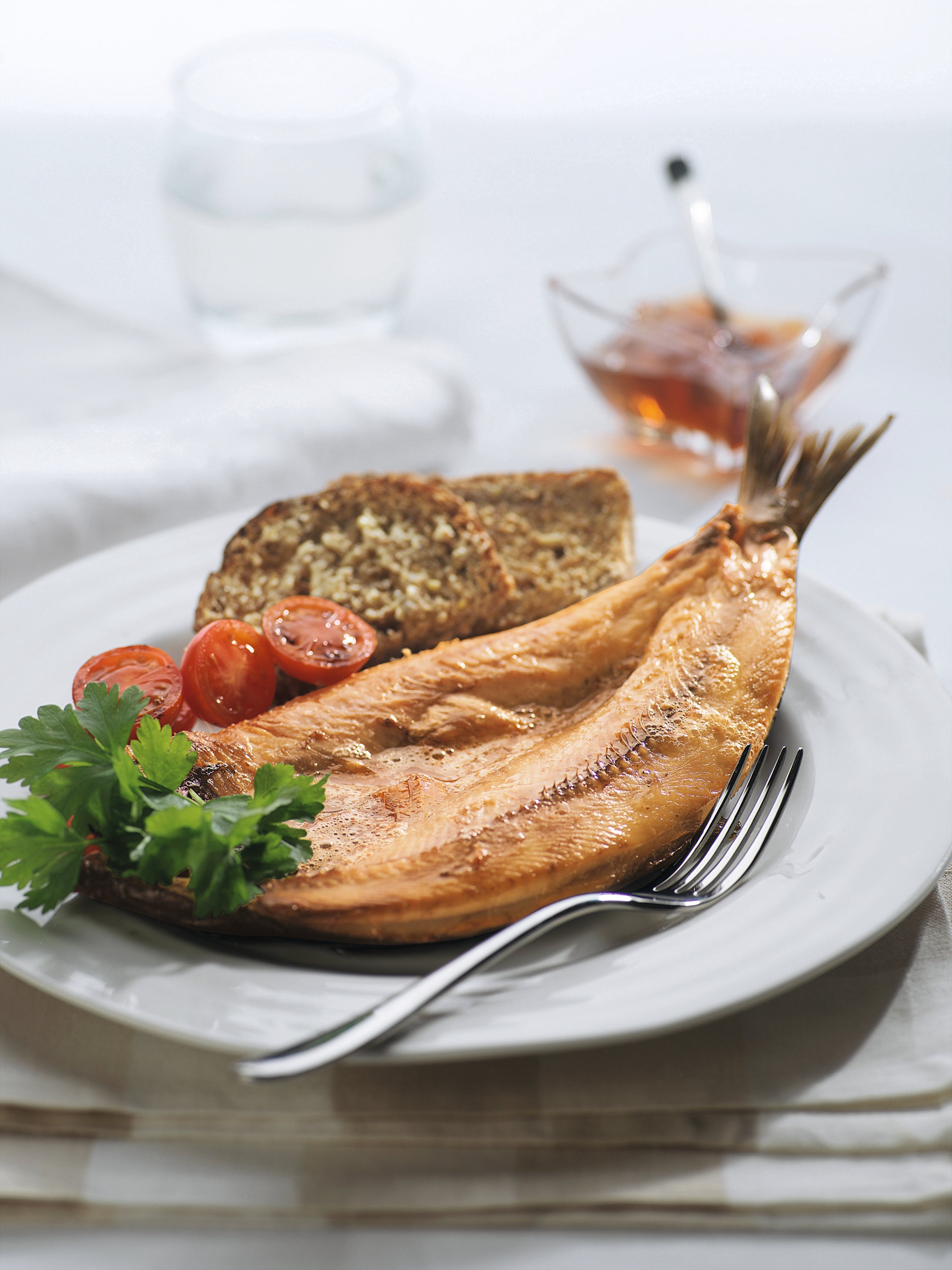 A traditional Inverawe kipper breakfast with toast and tomatoes