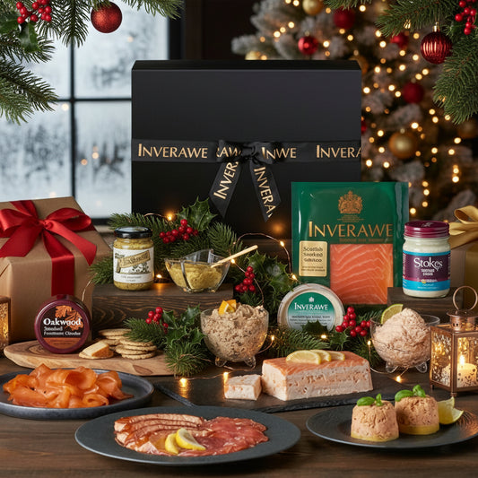 A gift box labeled 'Inverawe' with an assortment of food items including smoked salmon, oatcakes, and various spreads.