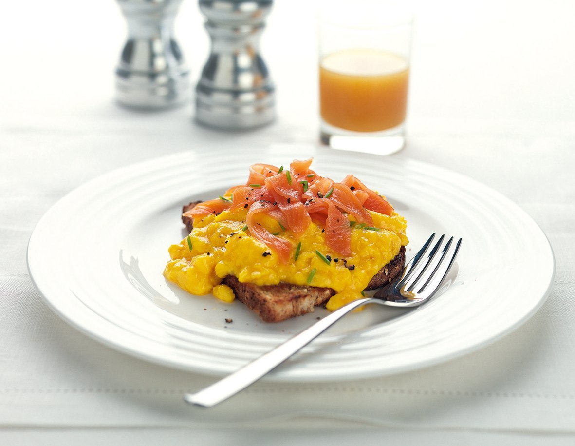 Smoked salmon with scrambled eggs on toast